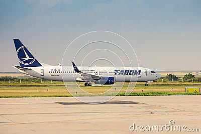 Commercial passenger jet airliner Boeing 737-800 of the Romanian Tarom Airline Editorial Stock Photo