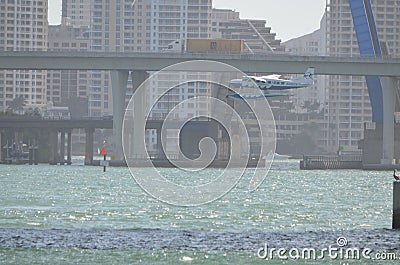 Commercial Passenger Sea Plane Preparing to Land Editorial Stock Photo