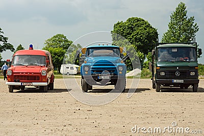 Commercial trucks Ford Transit (left), a popular soviet truck ZIL-130 (center), Mercedes-Benz T2 (right) Editorial Stock Photo