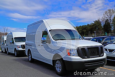 White Commercial Vans Stock Photo