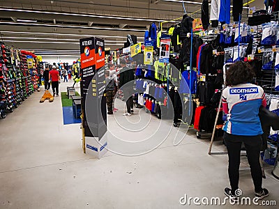 Commercial worker arranging the products at Decathlon Editorial Stock Photo