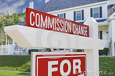 Commission Change For Sale Real Estate Sign In Front Of New House Stock Photo