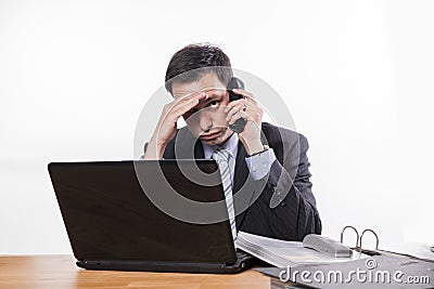 Committed employee bad news at phone Stock Photo