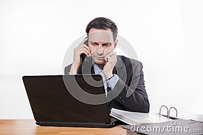 Committed employee bad news at phone Stock Photo