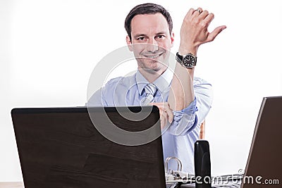 Committed employee pulling up sleeves Stock Photo