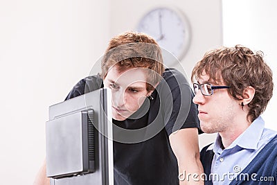 Committed office workers working together Stock Photo