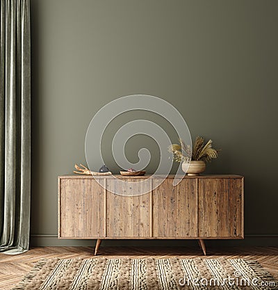 Commode with decor in living room interior, dark green wall mock up background Stock Photo