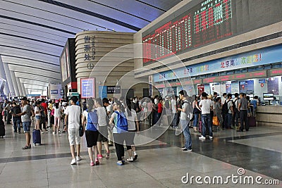 A common day and travellers pending in Beijing South Railway station Editorial Stock Photo