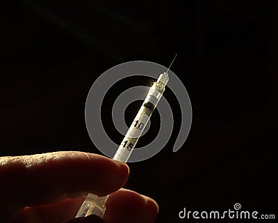 common syringe used by the medical profession by hospital and veterinary services. Stock Photo