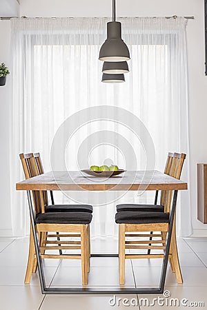 Communal table with chairs Stock Photo