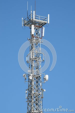 Communication antenna tower and repeater equipment Stock Photo