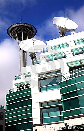 Communication media center & Seattle needle tower. Editorial Stock Photo