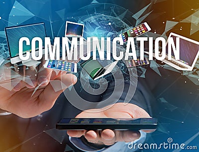 Communication title surounded by device like smartphone, tablet Stock Photo
