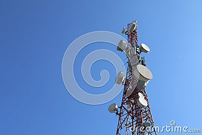 Communication tower. Telco Trellis for 3G 4G 5G Apocalypse Internet Communication, mobile, FM Radio and Television Broadcasting On Stock Photo