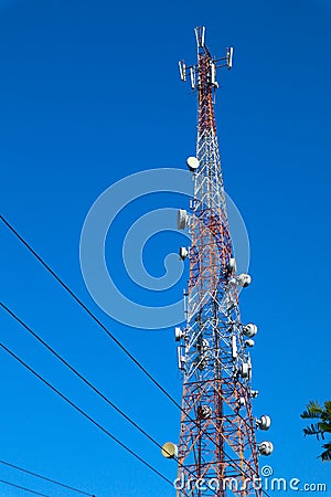 Communication tower. Telco Trellis for 3G 4G 5G Apocalypse Internet Communication, mobile, FM Radio and Television Broadcasting On Stock Photo