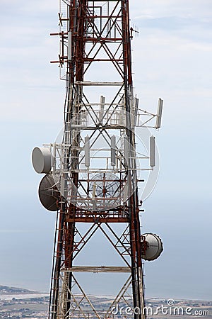 Communications tower, against the sea Stock Photo