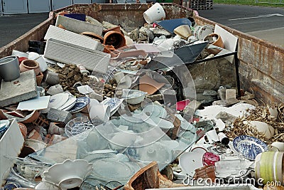 Community garbage disposal for population to depose safely old, broken and no longer needed home objects. Stock Photo