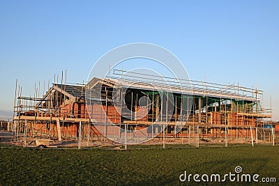 Community hall under construction, roof in place Stock Photo