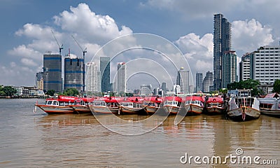 Commuter boats tethered to each other Editorial Stock Photo