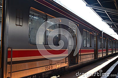 Commuter Line or electric train in Jakarta, Indonesia Editorial Stock Photo