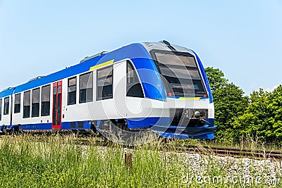 Commuter train, develops speed . Stock Photo