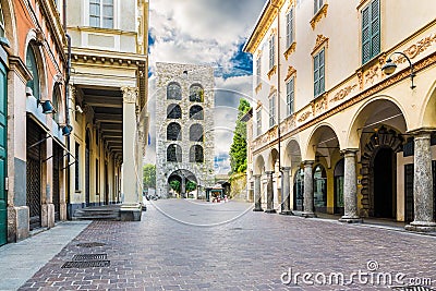 Como city, historic center, lake Como, northern Italy. Medieval tower 12th century, called Porta Torre and via CantÃ¹ Stock Photo