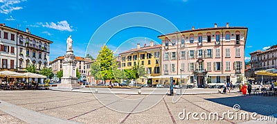 COMO, ITALY, JULY 17, 2019: People are strolling on Piazza Alessandro Volta in Italian town Como Editorial Stock Photo