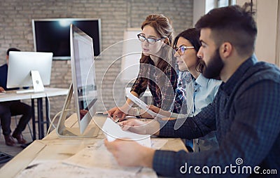 Company employees working in office Stock Photo