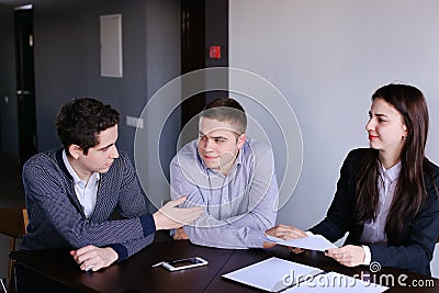 Company of insurance agents of women and men prepares opinion on Stock Photo