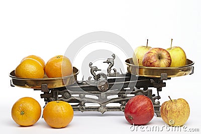 Compare apples to oranges Stock Photo
