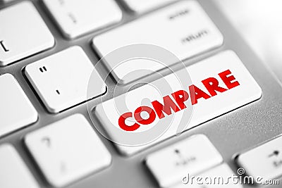 Compare - estimate, measure, or note the similarity or dissimilarity between, text concept button on keyboard Stock Photo