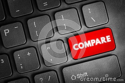 Compare - estimate, measure, or note the similarity or dissimilarity between, text concept button on keyboard Stock Photo