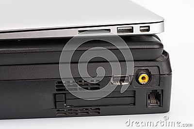 Comparing of laptops, new modern and old laptop, present and pas Stock Photo