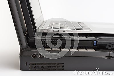 Comparing of laptops, new modern and two old laptops. Stock Photo