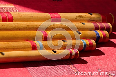 India, Comparison of different sizes of hindu bamboo flute called Bansuri. Stock Photo