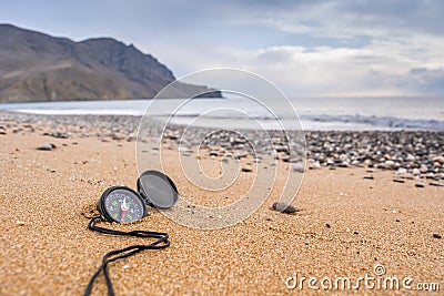 Compass on the beach Stock Photo