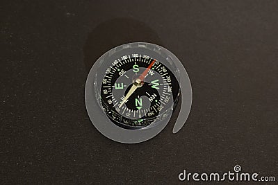 Compass on black background. Stock Photo