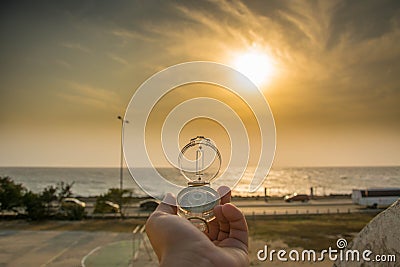 Compass close up with nice sunset Stock Photo