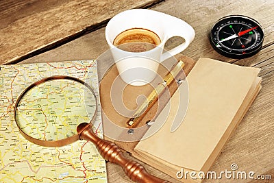 Compass Magnifier Vintage Notepad Gold Pen Coffee Cup Wood Table Stock Photo