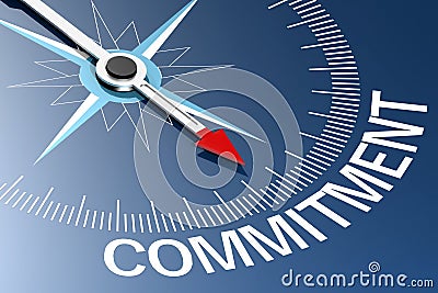 Compass needle pointing to commitment word Stock Photo