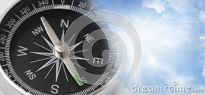Compass in sky Stock Photo