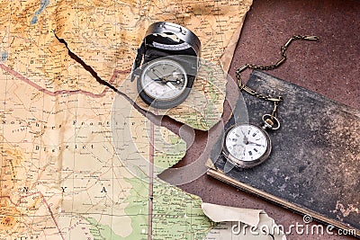 Compass vintage map torn with pocket watch on ancient diary Vector Illustration