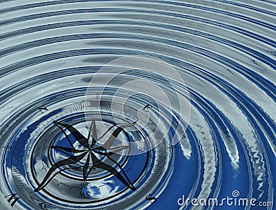 The compass (wind rose) in the water Stock Photo