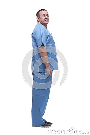 competent mature paramedic looking at you. isolated on white background. Stock Photo