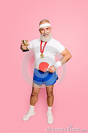 Competetive cool healthy modern successful active grandpa with table tennis equipment. Healthcare, weight loss, bodycare Stock Photo