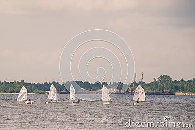 Sailboats competition on the river Editorial Stock Photo