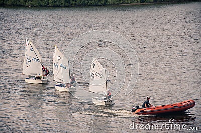 Sailboats competition on the river Editorial Stock Photo