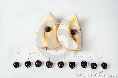 Compisition on white background with fruit. Melon and cherrys Stock Photo