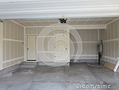 Complete garage of a wooden house Stock Photo