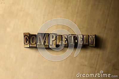 COMPLETELY - close-up of grungy vintage typeset word on metal backdrop Cartoon Illustration